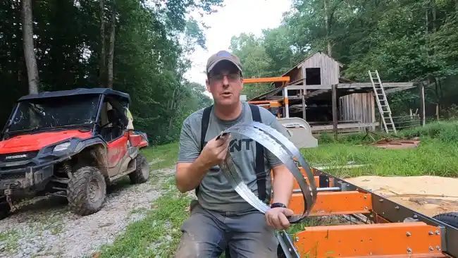 How do you unfold a large bandsaw blade