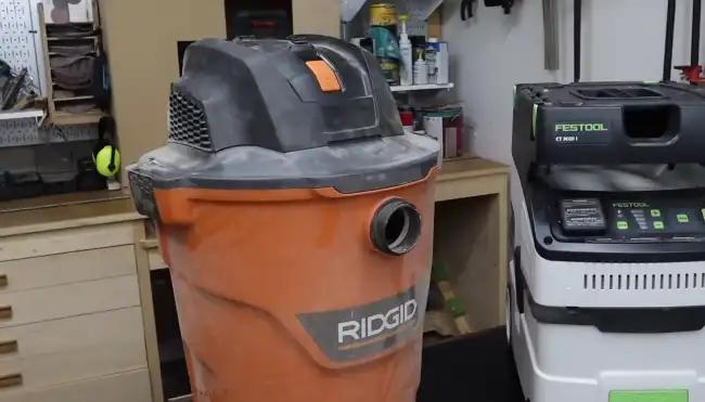 How much dust can a shop vacuum collect on a table saw
