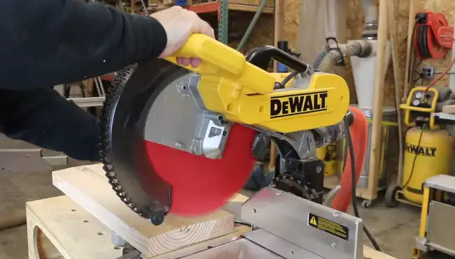 How wide of the board can a DeWalt miter saw cut